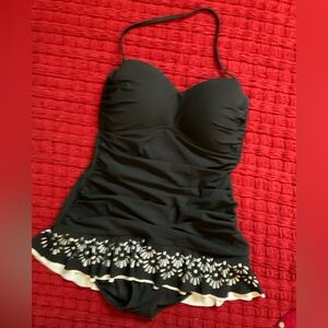 Womens swimsuit with removable strap and molded cups. Worn only once.